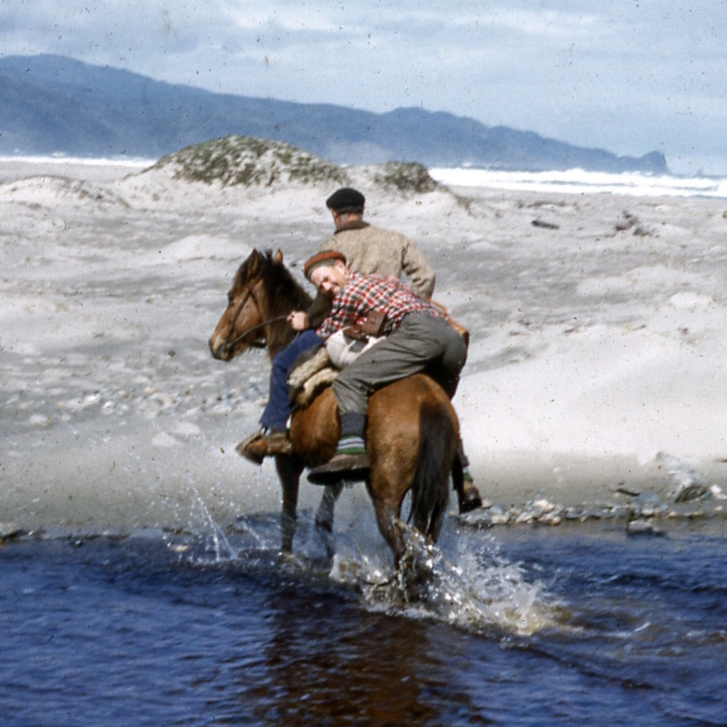George Knox fording a river on horseback, 1958 (detail)