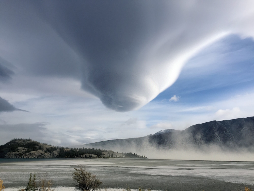 A large, cone shaped, funnel cloud.