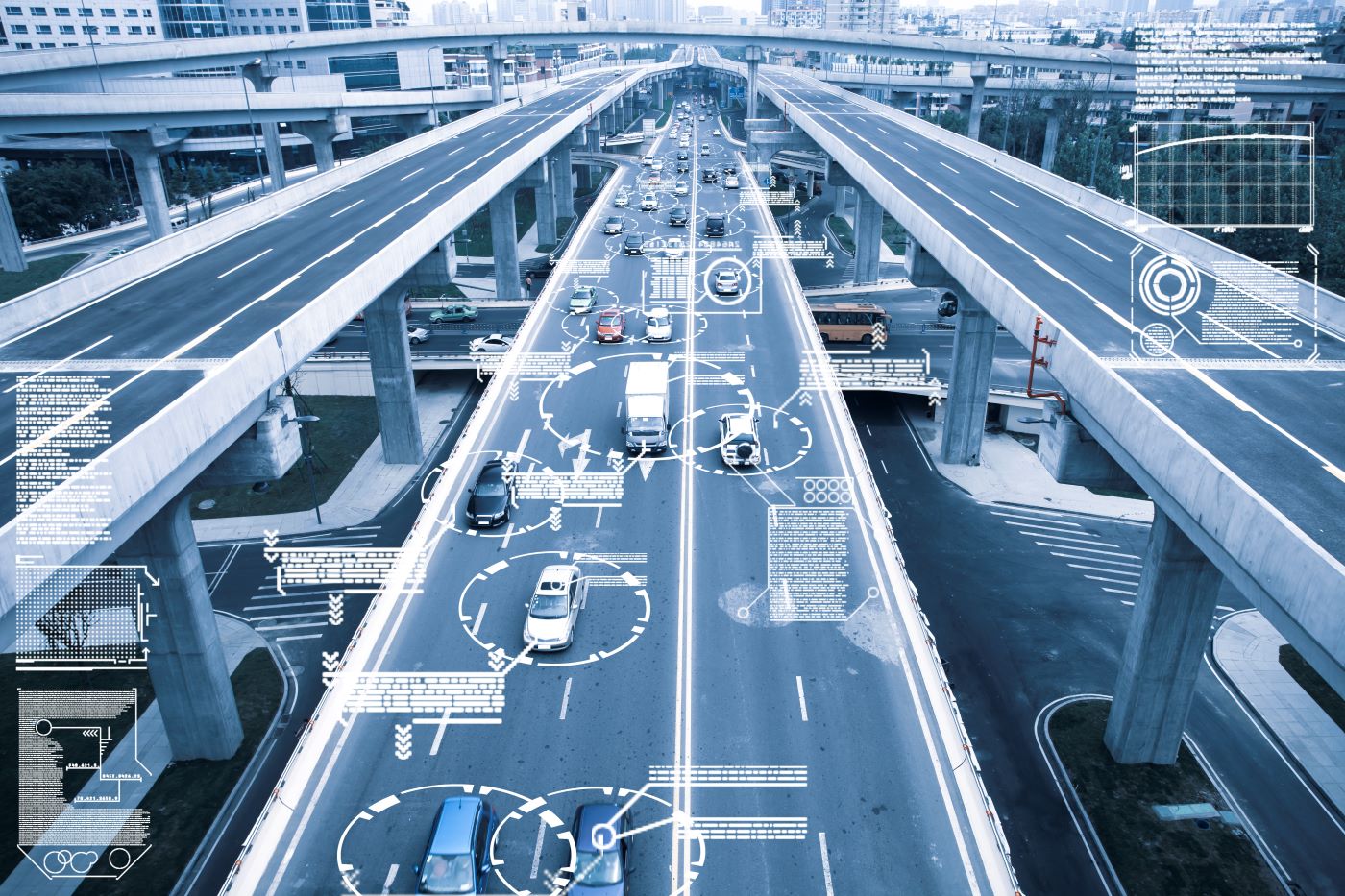 A futuristic looking city with artificial intelligence being applied to improve traffic on roads