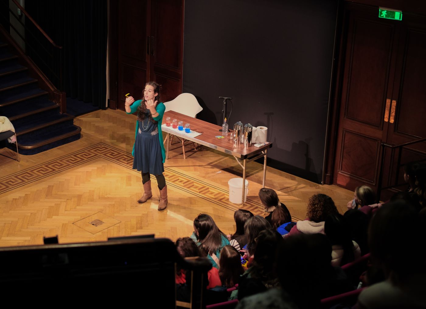 Dr Emily Grossman delivering a science show to a live audience