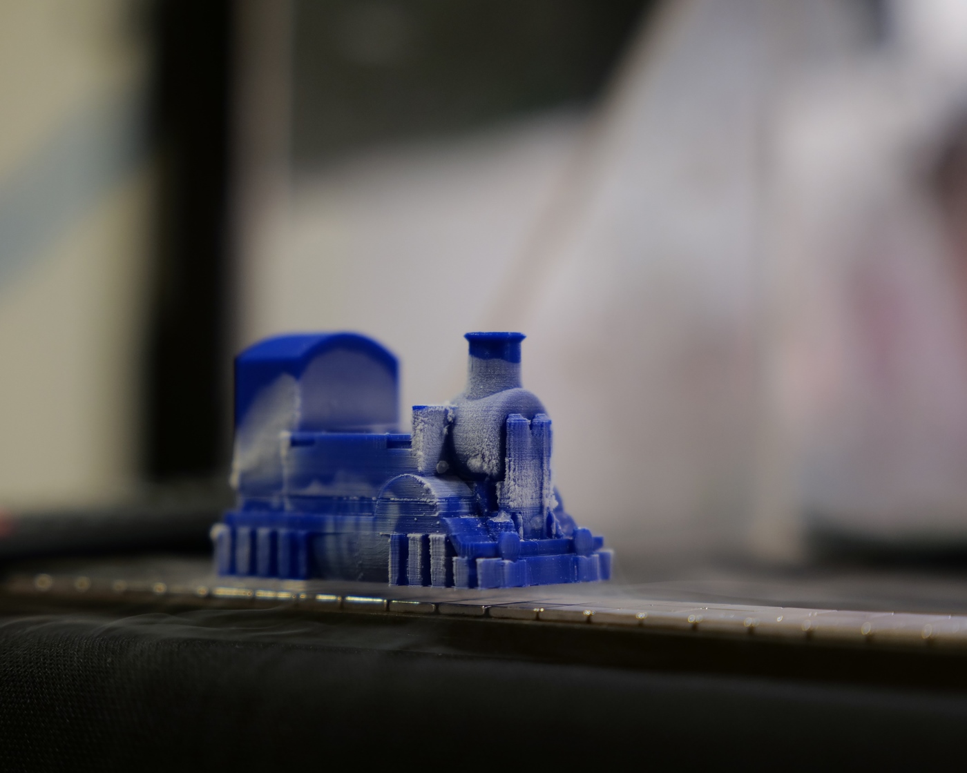 A miniature train experiencing the effects of liquid nitrogen
